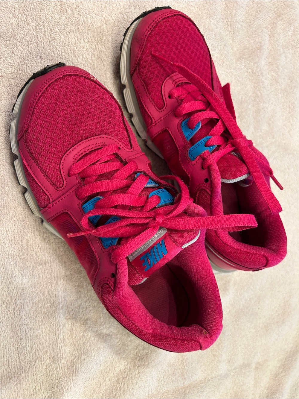 Nike Women's Bright Pink Athletic Sneakers with Blue Accents